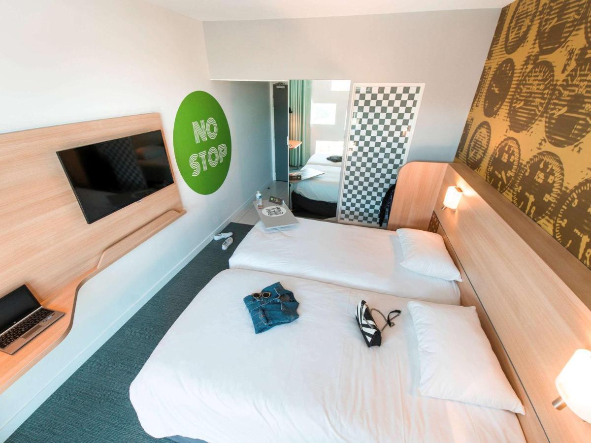 Отель Ibis Styles Le Mans Sud Мюлзан Экстерьер фото